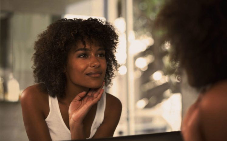 woman-looking-in-mirror-WEB-1080x675